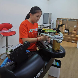 Leow Yee Peng participating in BSW stringing training session Certified Stringer