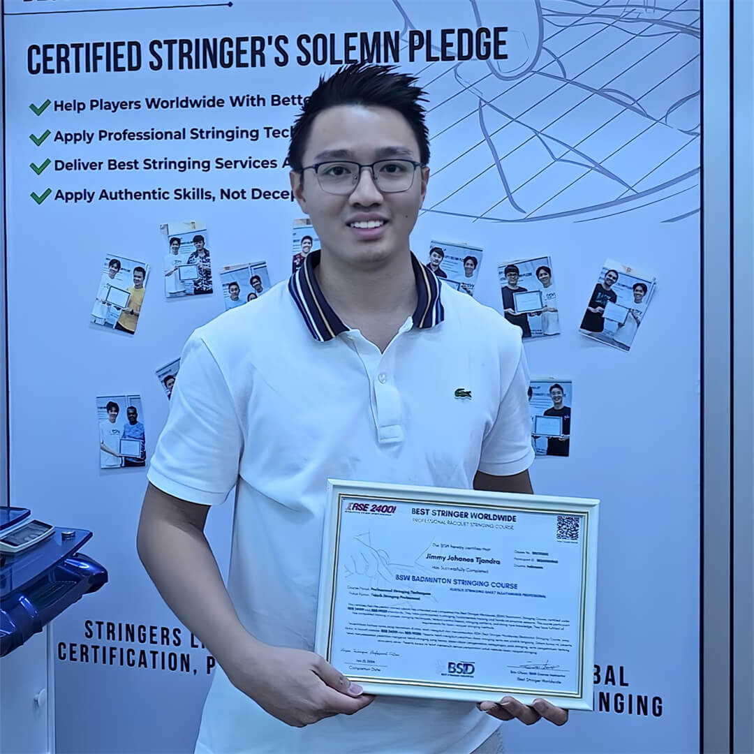 Jimmy Johanes Tjandra Certified Stringer from Indonesia working with racquet stringing machine at BSW certification class BSID Jimmy Johanes Tjandra Certified Stringer from Indonesia working with racquet stringing machine at BSW certification class