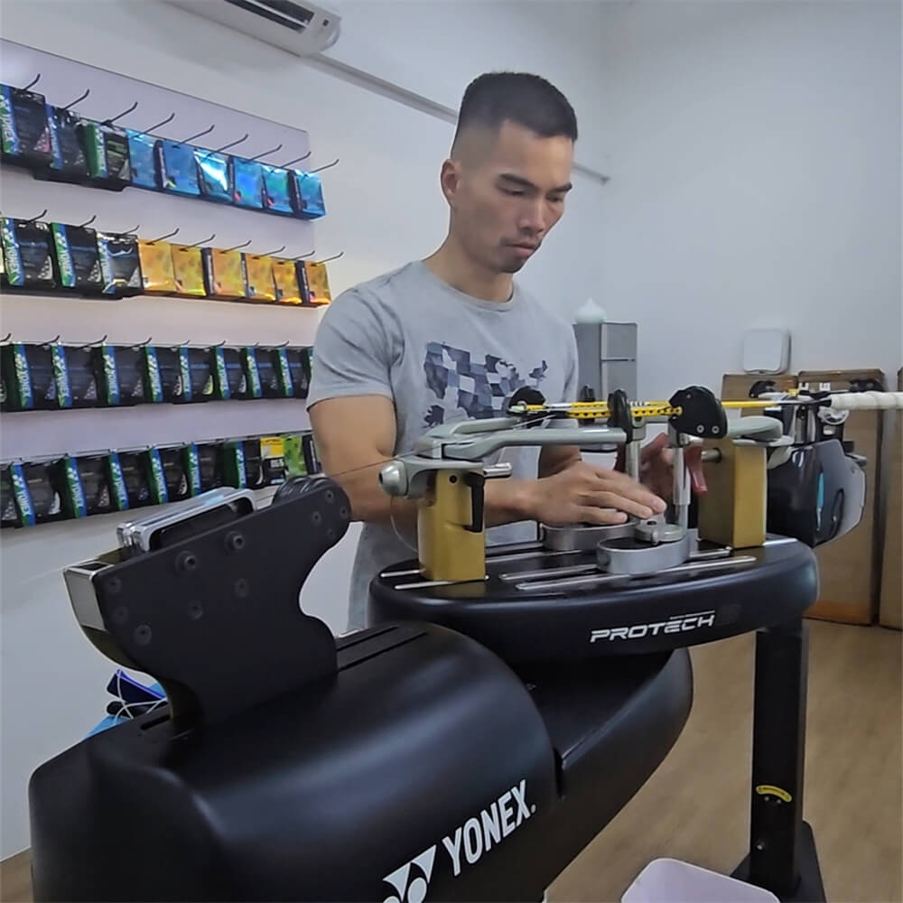 Chin-Teng Lin (Gary) mastering badminton stringing techniques at BSW course in Sydney