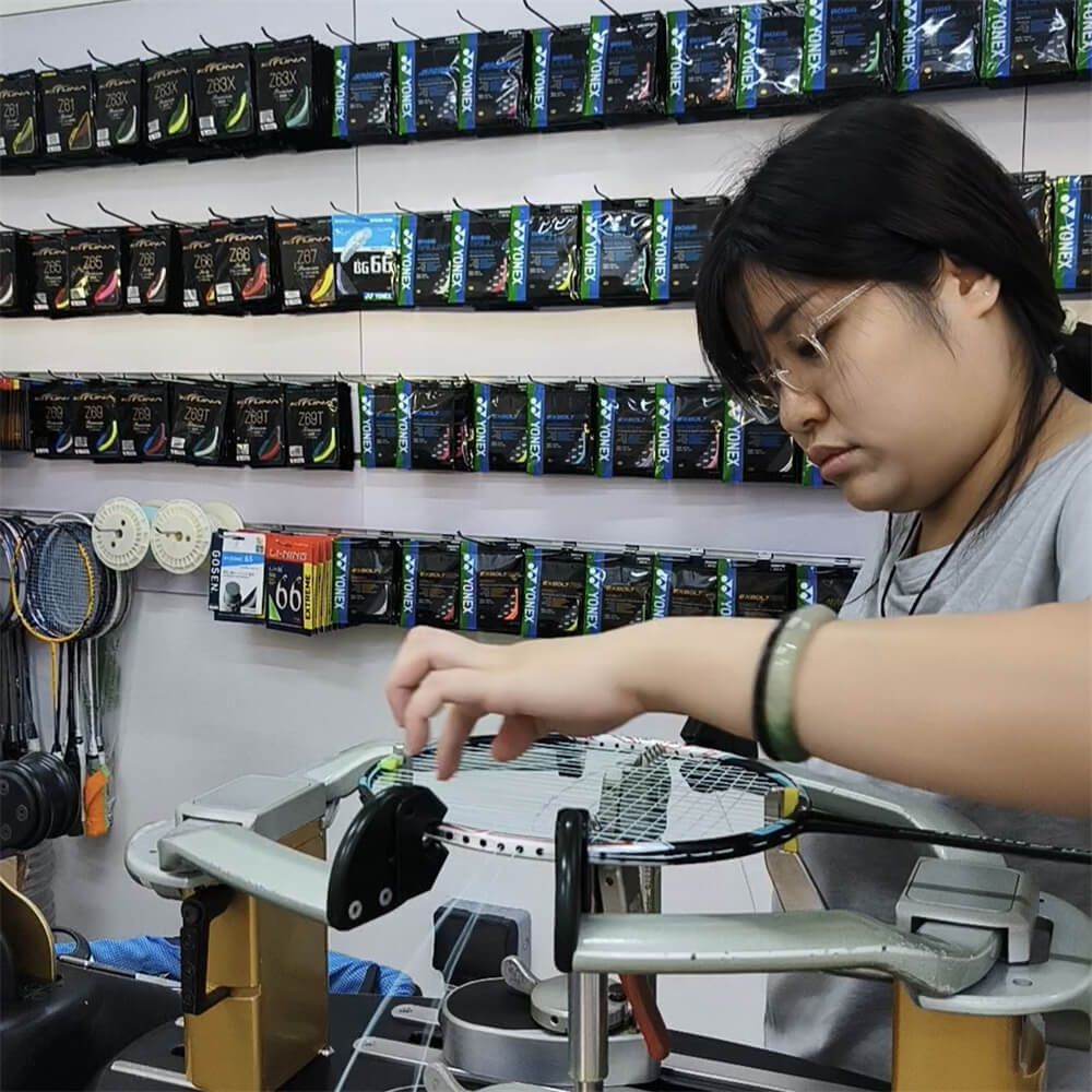 Elise Leong working with different racquet types at BSW course