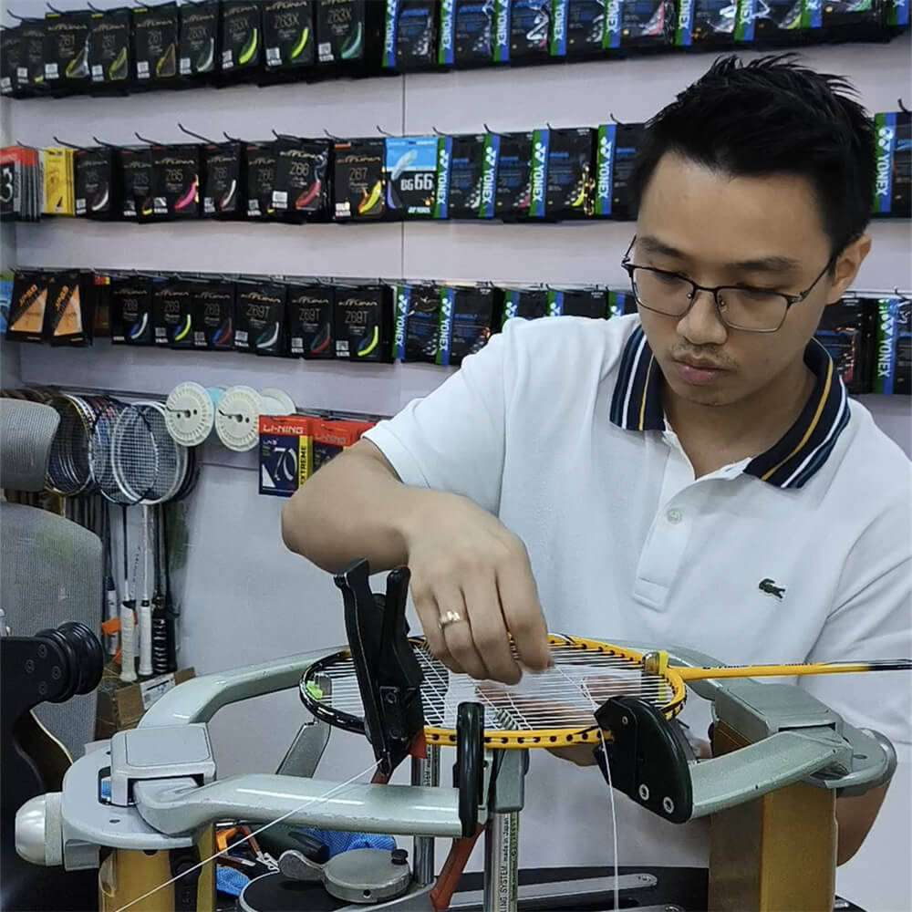 Jimmy Johanes Tjandra mastering badminton stringing techniques at BSW course in Kota Kupang