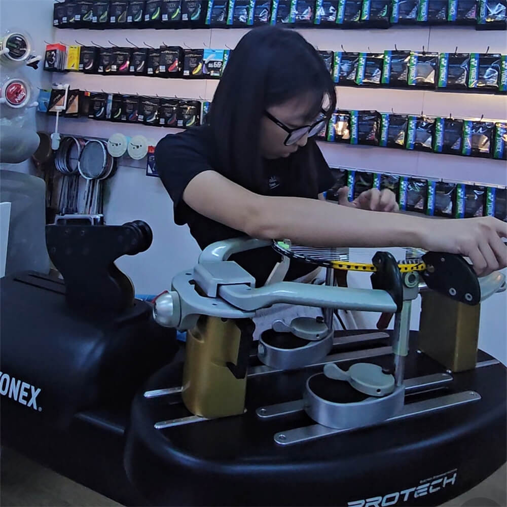 Kee Xue Jing mastering badminton stringing techniques at BSW course in Kuala Lumpur
