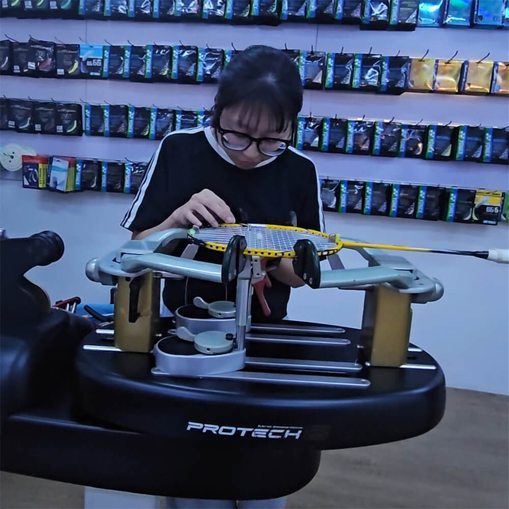 Kee Xue Jing studying badminton stringing theory at BSW class