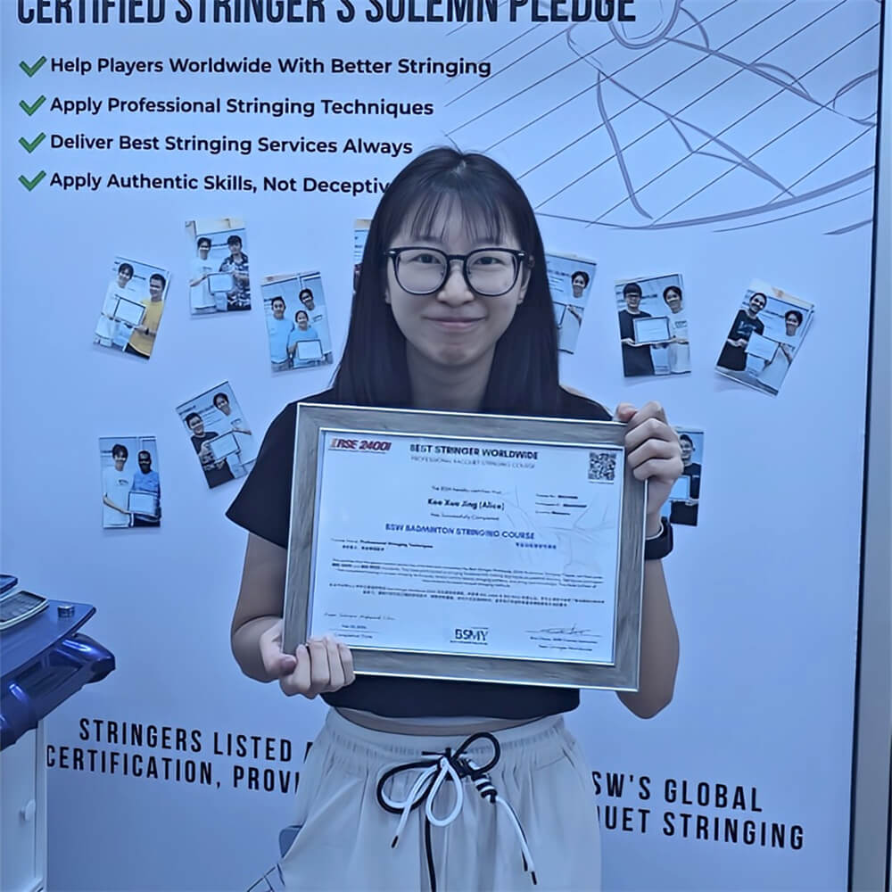 Kee Xue Jing tying knots for racquet stringing at BSW badminton stringing course BSMY