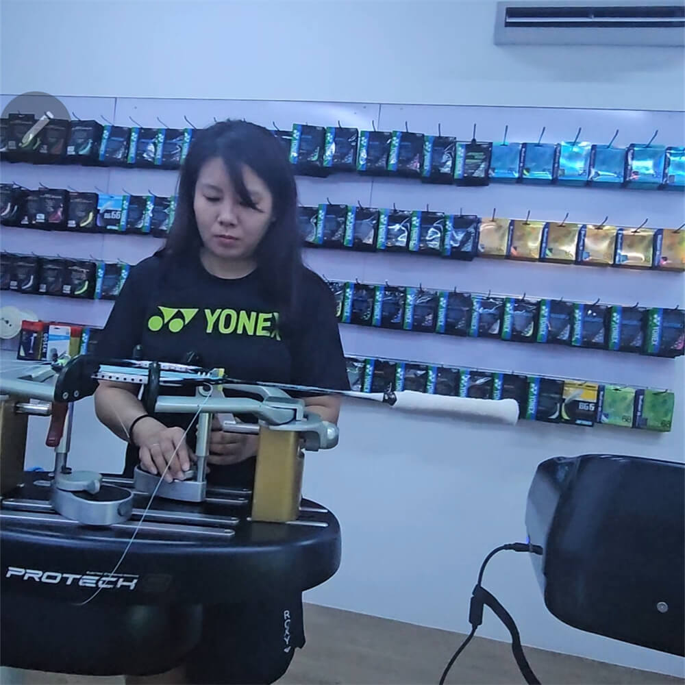 Lim Mei Wern mastering badminton stringing techniques at BSW course in Singapore