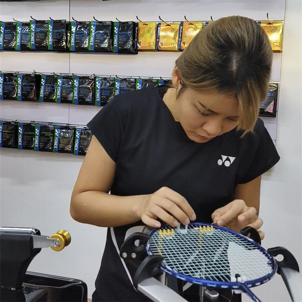 Mindy Teo mastering badminton stringing techniques at BSW course in Boon Keng Mindy Teo mastering badminton stringing techniques at BSW course in Boon Keng