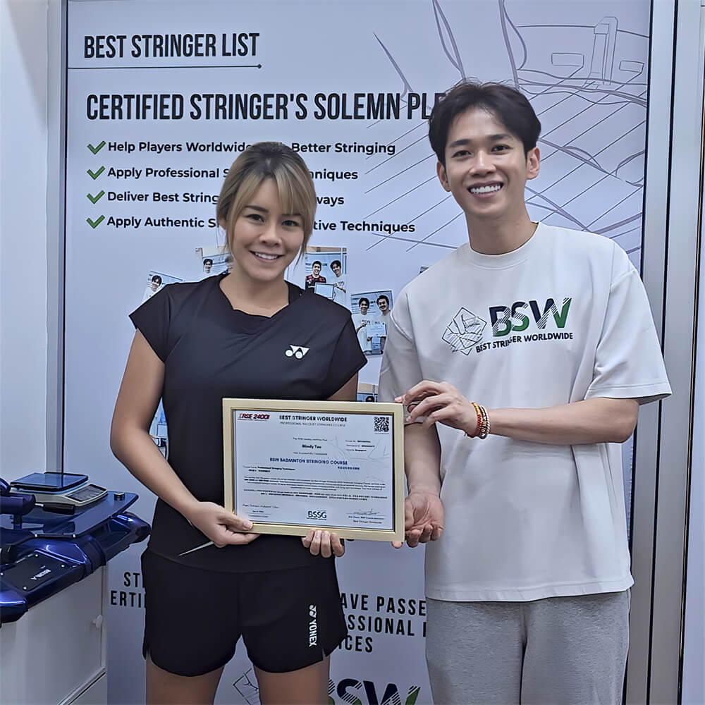 Mindy Teo receiving BSW badminton stringing course certification photo with Eric Chuar Mindy Teo receiving BSW badminton stringing course certification photo with Eric Chuar