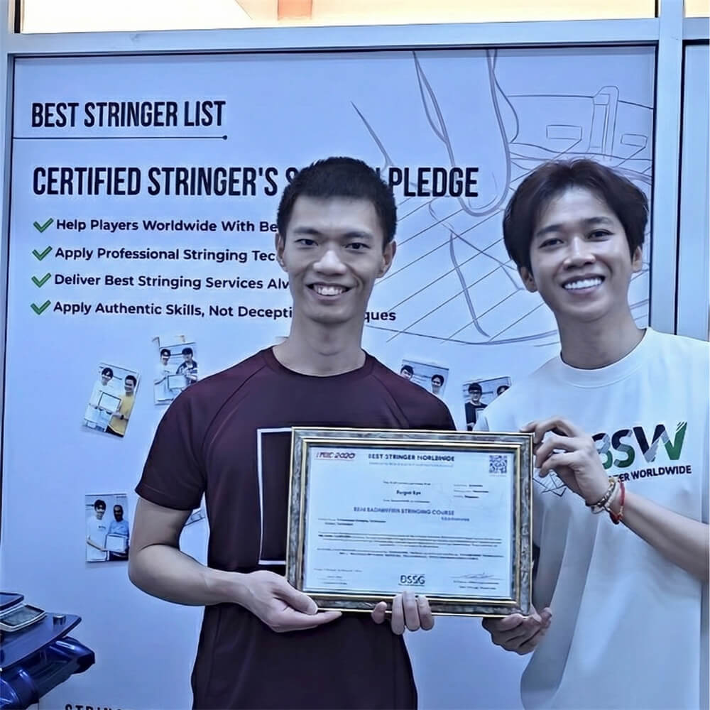 Roger Lin tying knots for racquet stringing at BSW badminton stringing course