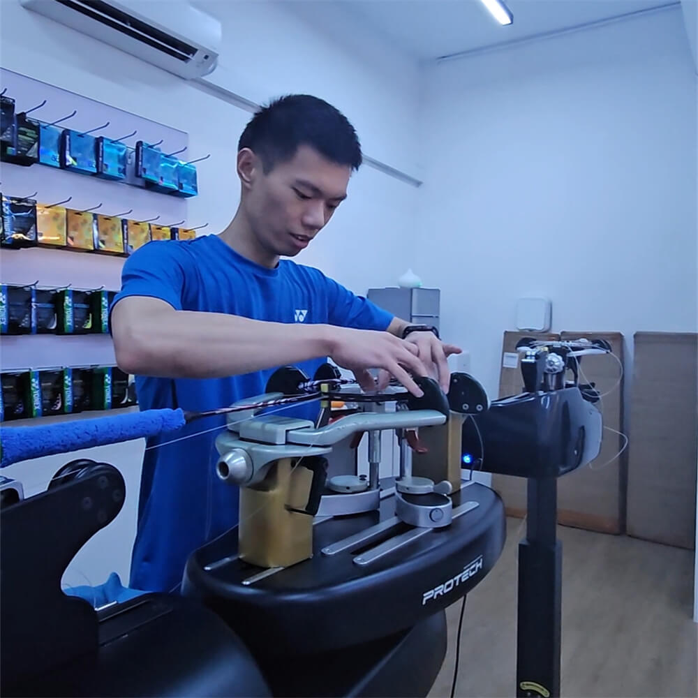 Roger Lin working with different racquet types at BSW course