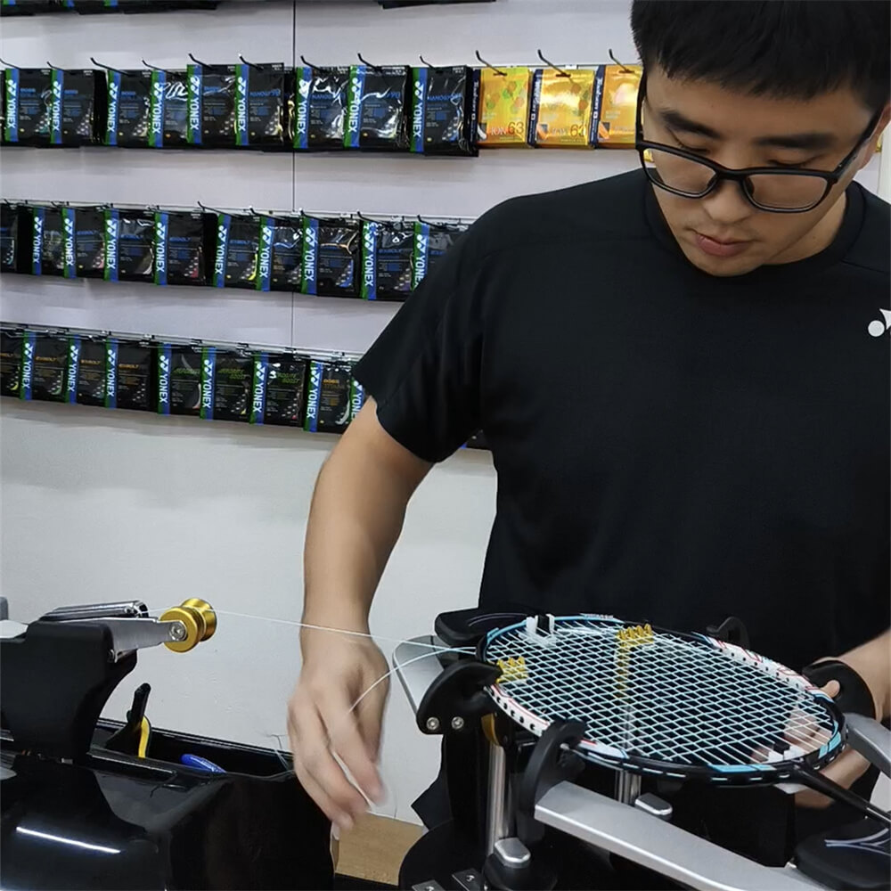 Wincent Chuah studying badminton stringing theory at BSW class