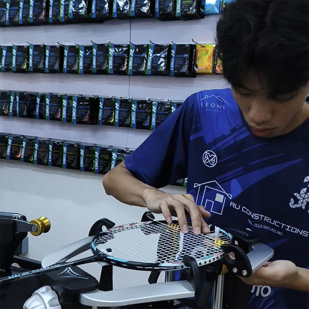 Yoon Jun Hin studying badminton stringing theory at BSW class Yoon Jun Hin studying badminton stringing theory at BSW class